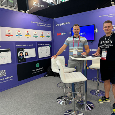 Photo of iDenfy team members at a conference.