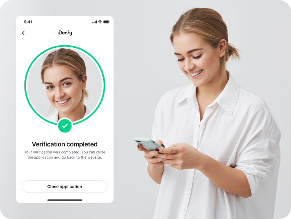 A person completing the identity verification process on her phone.